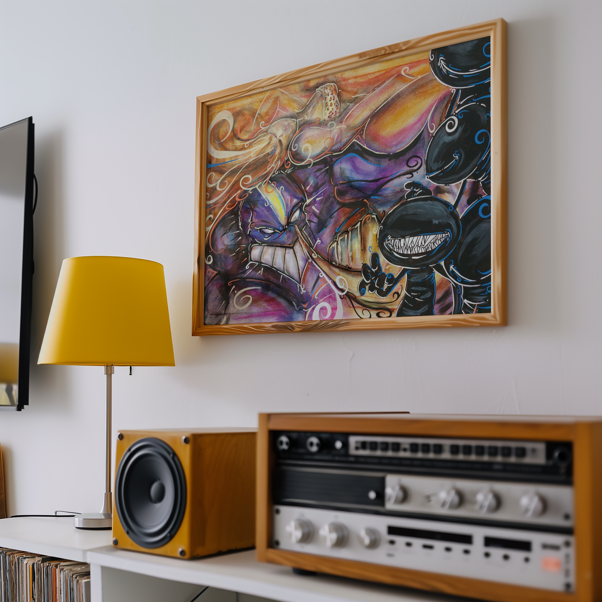 Framed The Maxx artwork hung above a record player