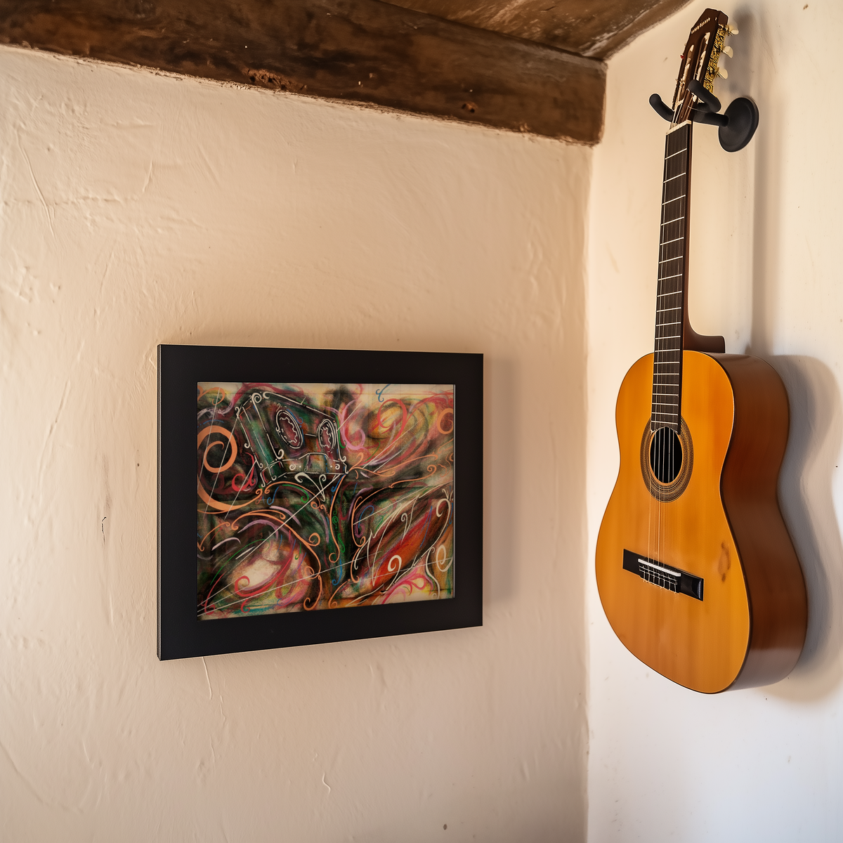 Small cassette tape art print on a wall