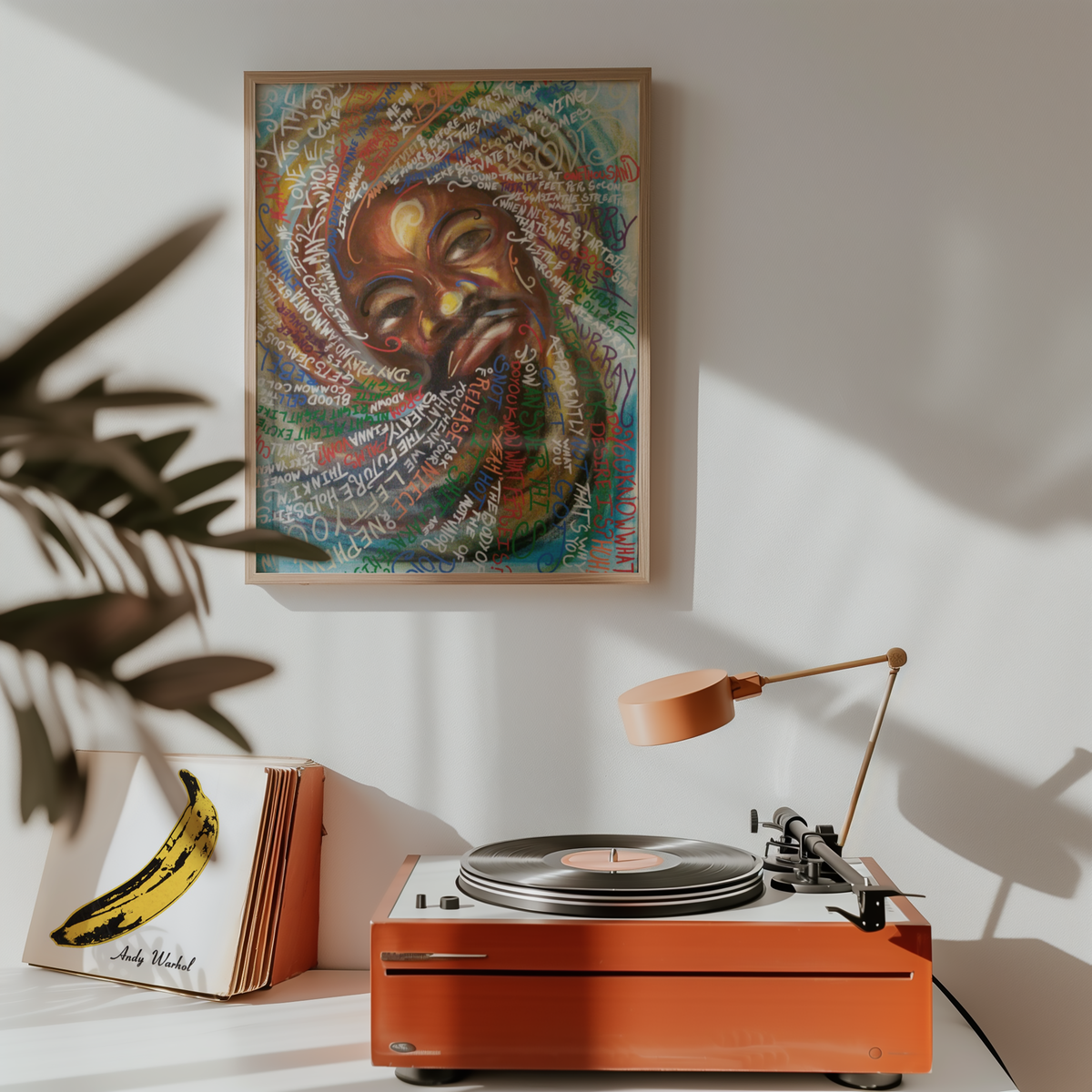 Medium 3000 art print hanging above a record player