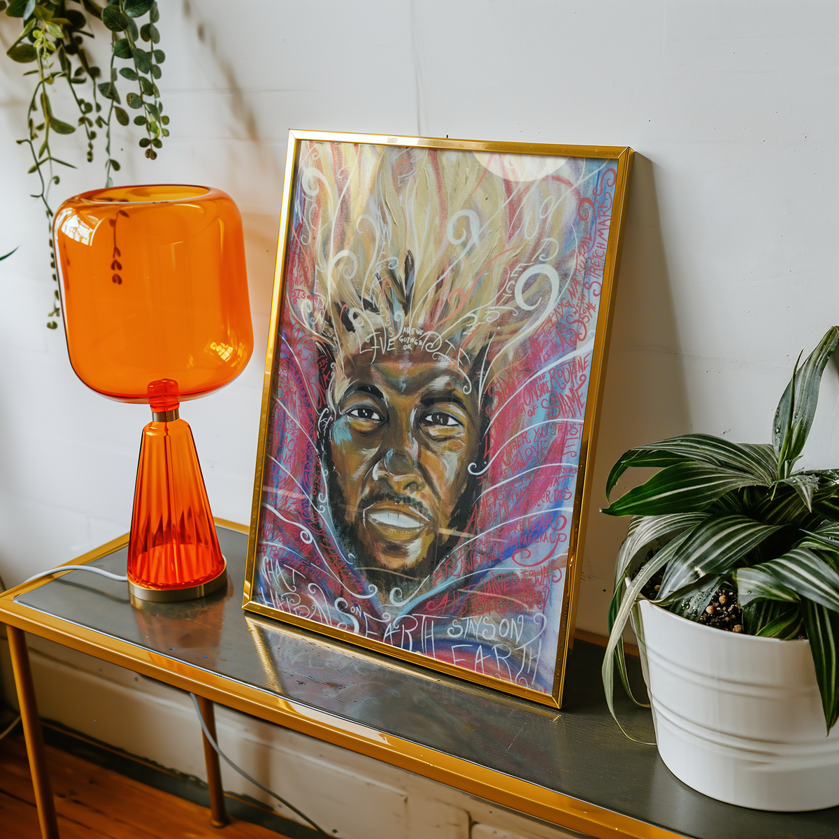 Small DAMN. art print on a table