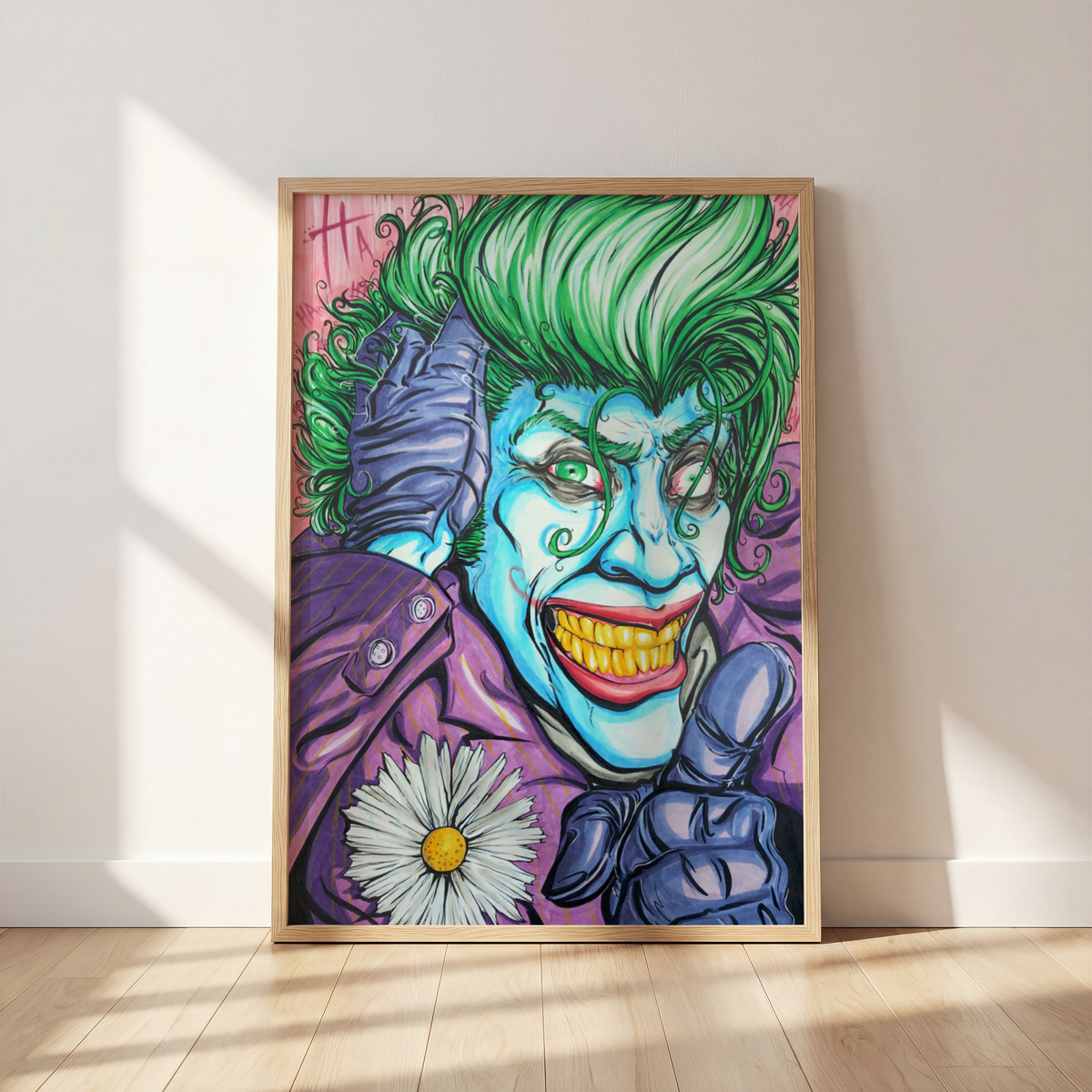 The Wild Card villain art print by Monty, framed and leaning against a wall