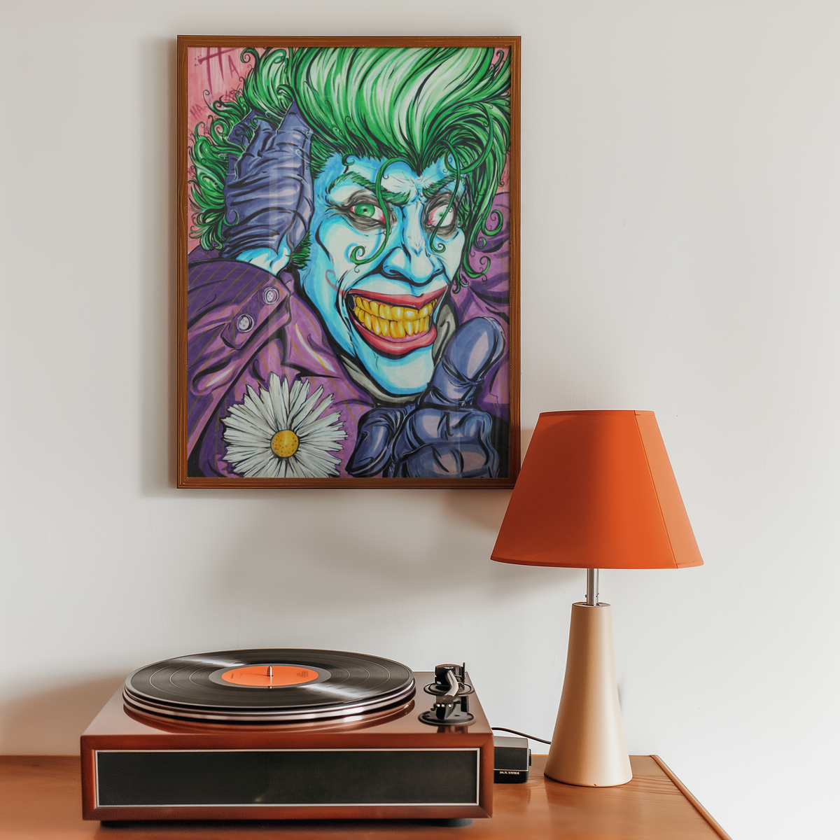 Small framed pop art wall art print above a record player