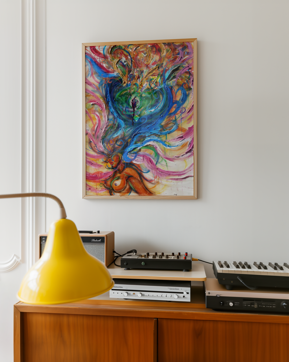 Medium growth wall art print hanging above a record player