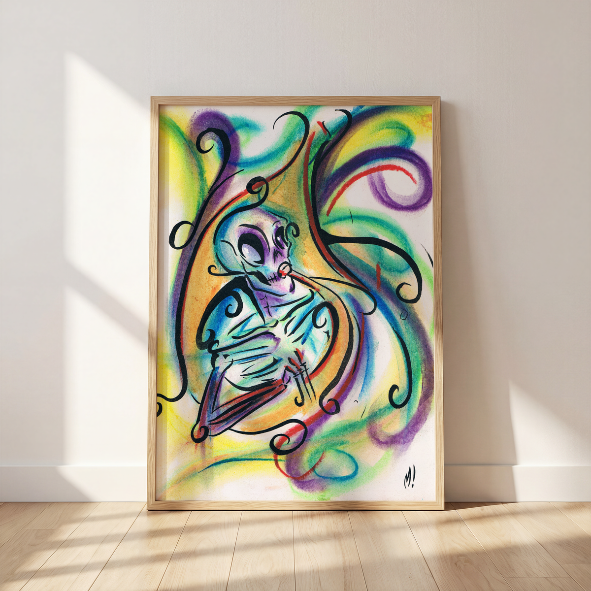 Close-up of framed skeleton tuba art print leaning against a wall, showing pastel detail of the skeleton playing tuba