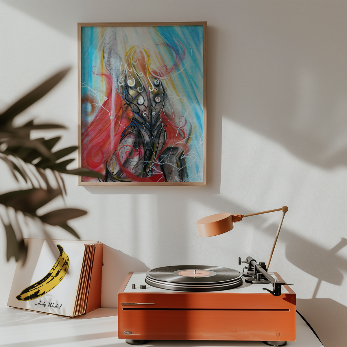 Medium framed Gathering Storm art print hung above a record player