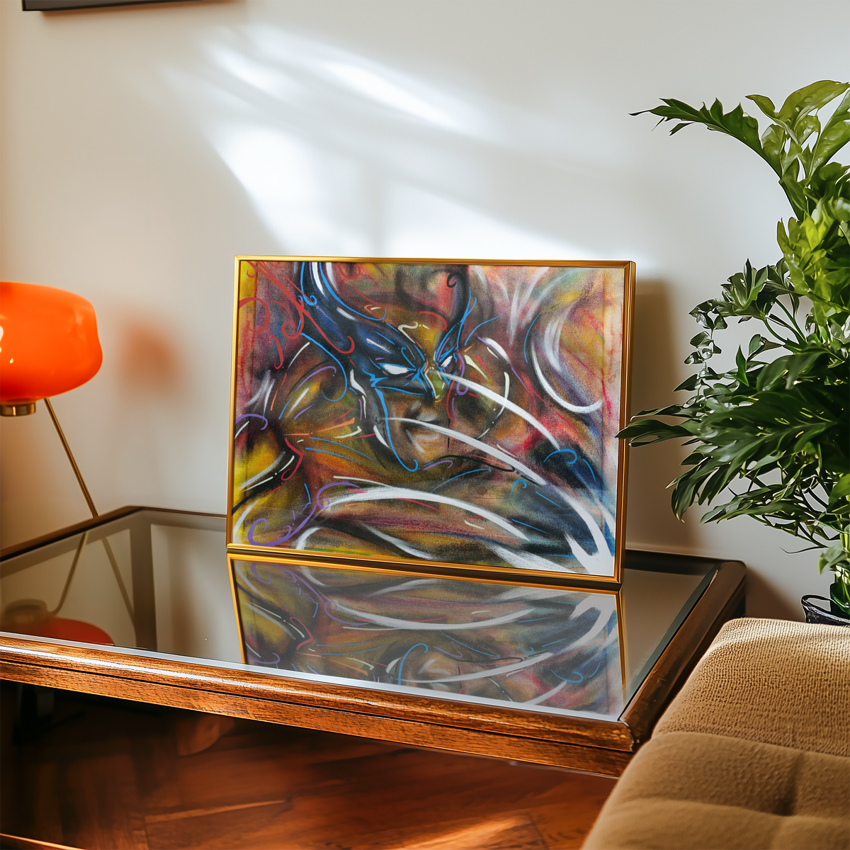 Small framed antihero art print on a table, comic book decor